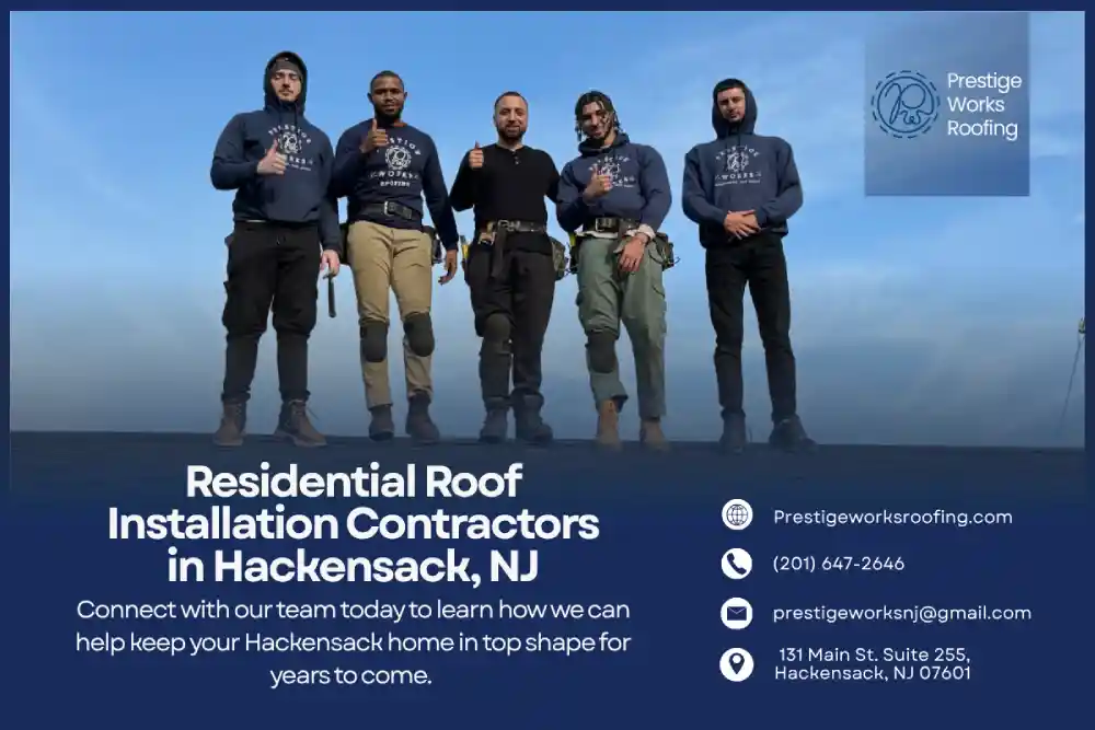 Professional roofing crew in uniforms standing together on Hackensack rooftop