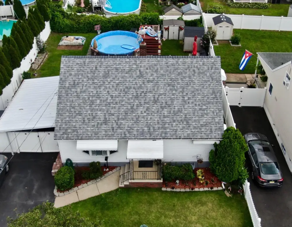 Professional checking roof flashing for leaks in Hackensack
